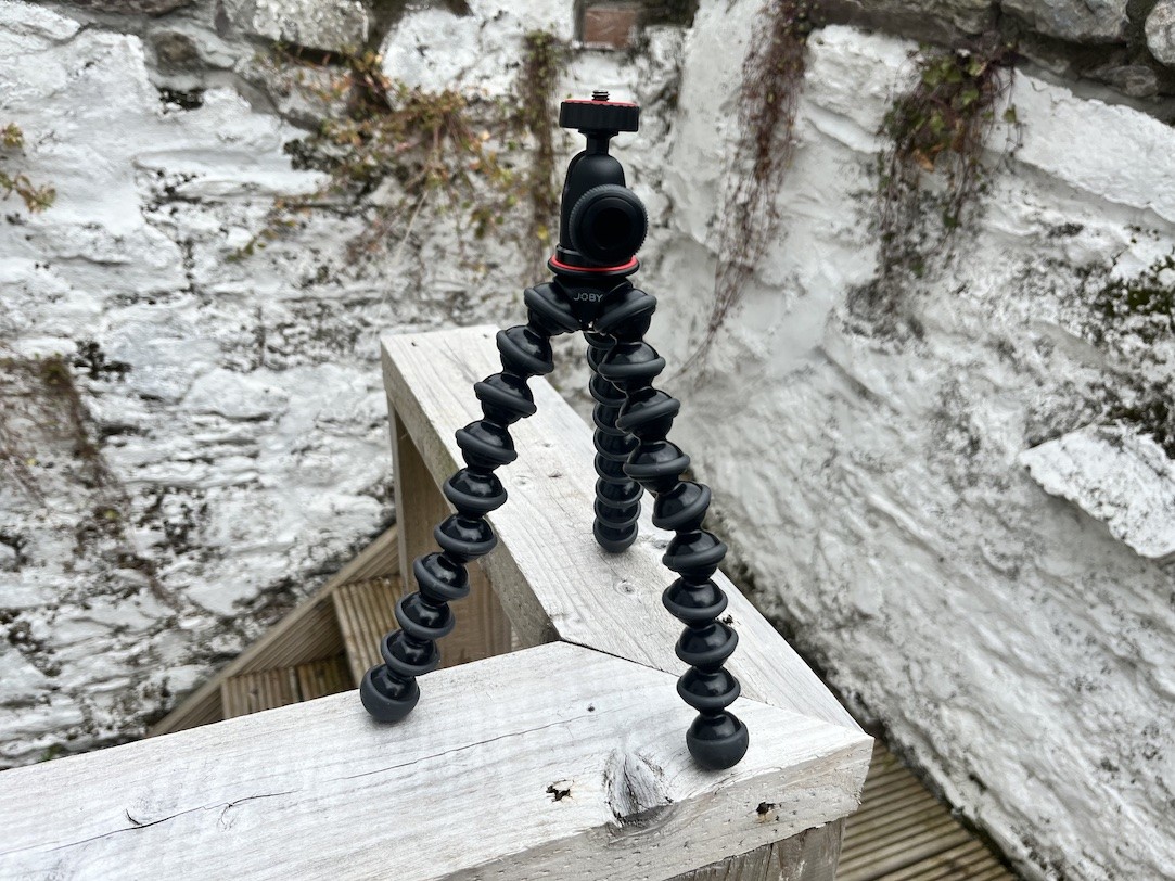 A Joby JB01503 GorillaPod 1K tripod on a railing outside