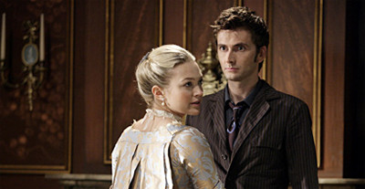 The Doctor waits for a (French) kiss, a scene highlighting the romantic and mysterious elements present in time-travel narratives.