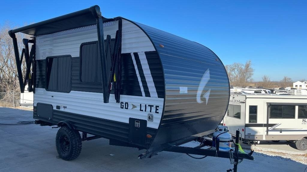 A small Go Lite travel trailer by Wayfinder RV, designed for compact SUVs
