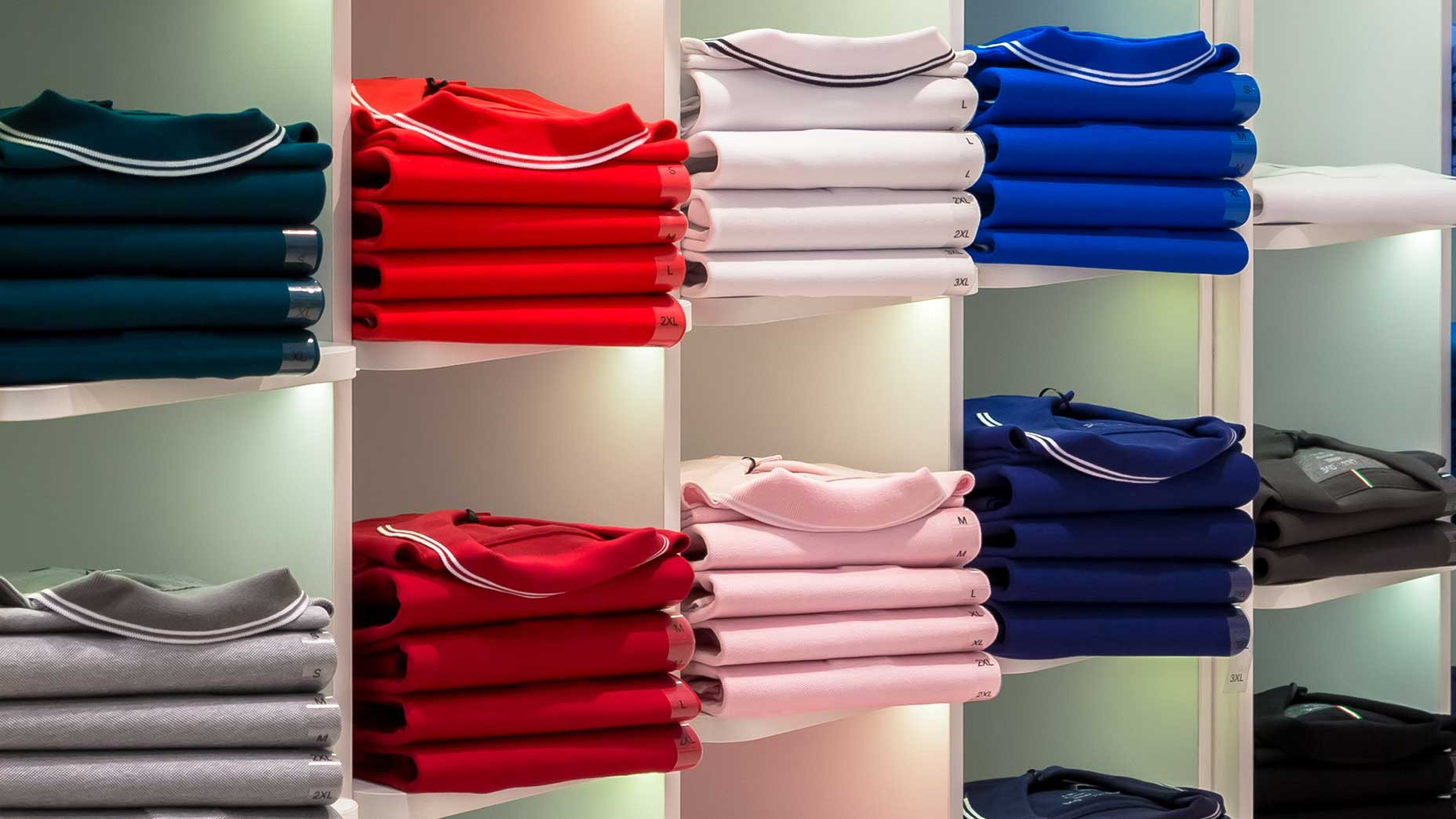 Polo shirts neatly folded in a suitcase
