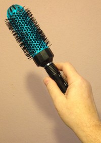 Compact round hairbrush for travel