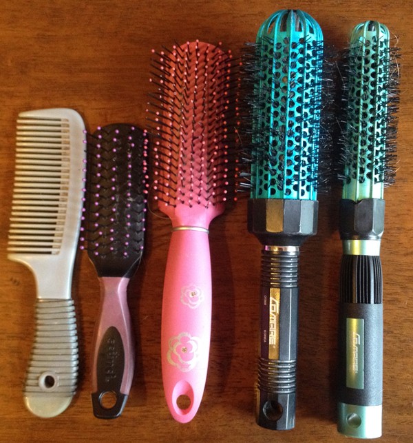 Various types of travel hairbrushes