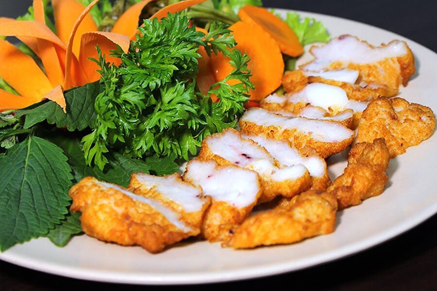 Ha Long Squid Cake (Cha muc Ha Long), a local specialty known for its crispy texture and unique aroma