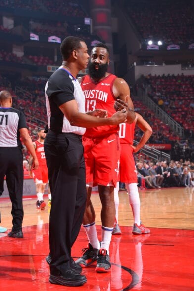 James Harden in action, his signature step-back move often debated for possible traveling violations, highlighting the need for precise officiating.