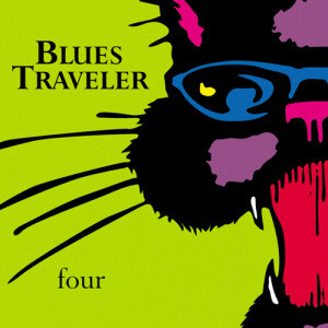 John Popper performing with Blues Traveler, showcasing his harmonica skills
