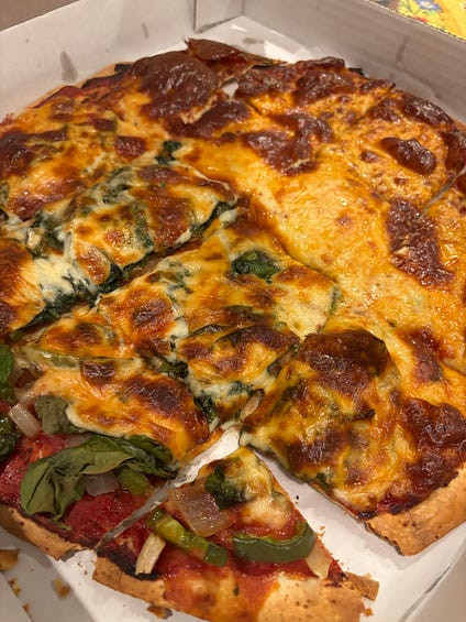 Washington Gardens half cheese half vegetarian pizza
