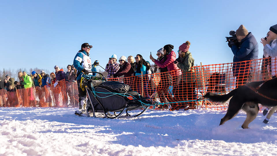 People gathered in Willow to watch the official start of the Iditarod