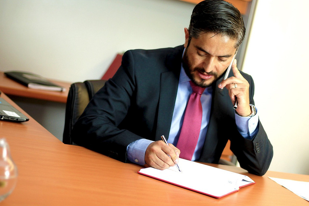 Lawyer working on a laptop while traveling