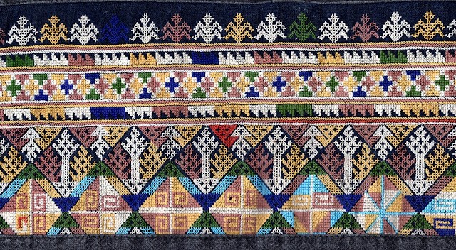 Yao embroidery from Thailand in my personal collection, showcasing the intricate craftsmanship and vibrant colors typical of this ethnic group's textiles.