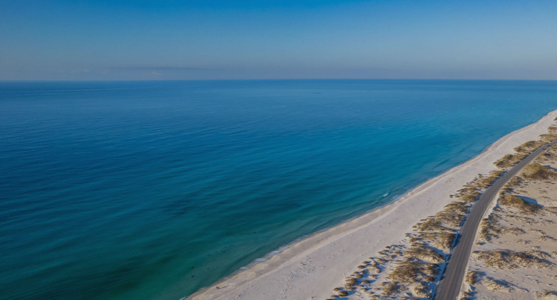 Scenic view of Gulf Islands National Seashore, Florida, featuring white sandy beaches and clear blue waters