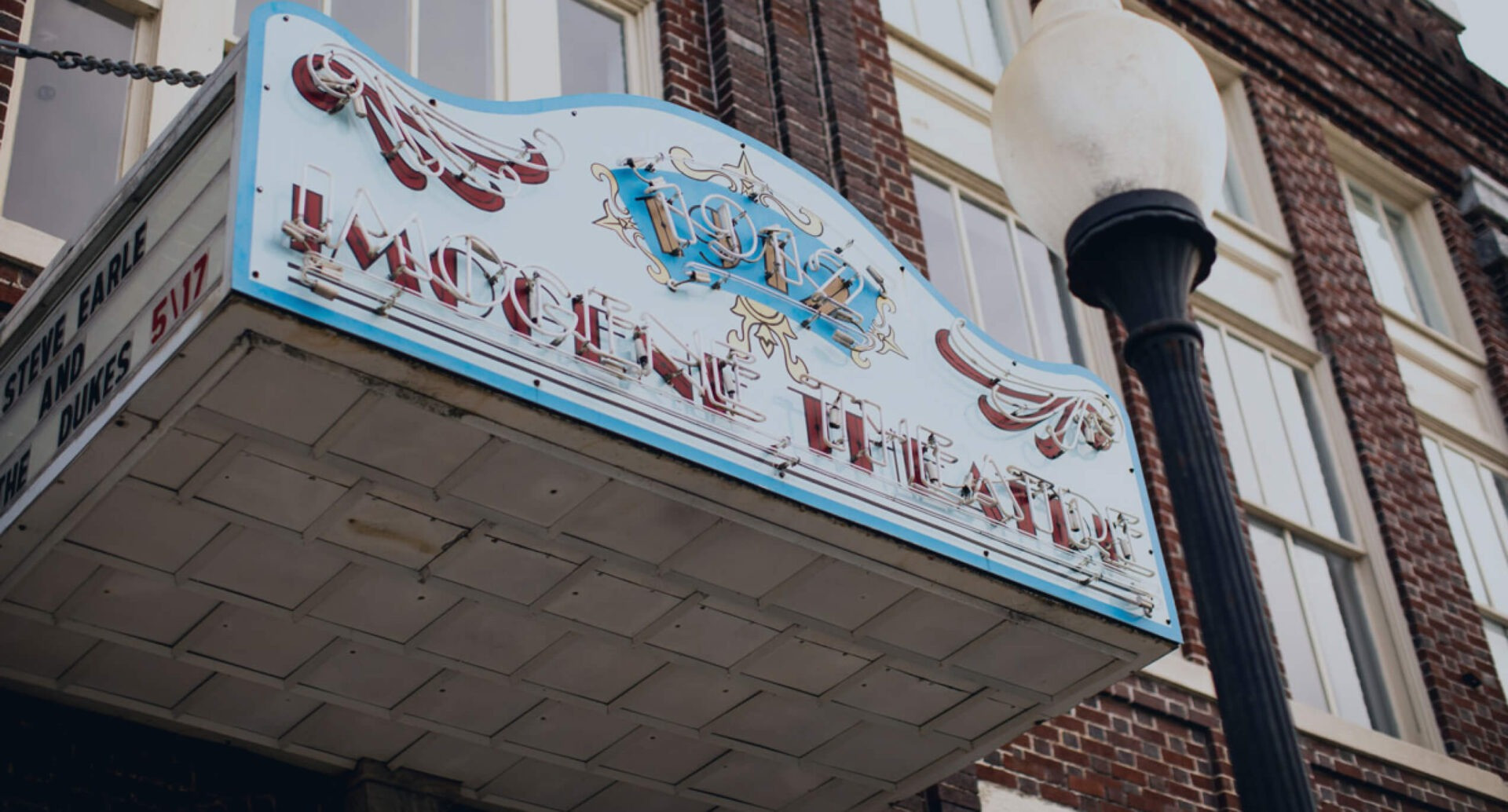Charming street scene in Historic Milton, Florida, featuring historic buildings and local shops
