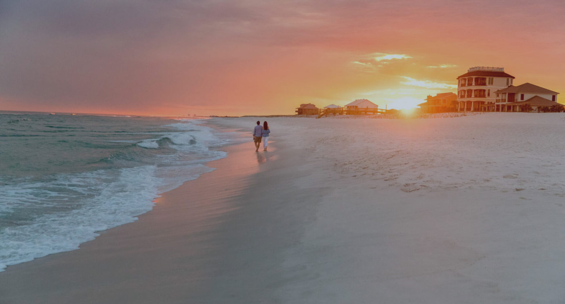 Aerial view of Navarre Beach, Florida, displaying its pristine coastline, clear waters, and peaceful atmosphere