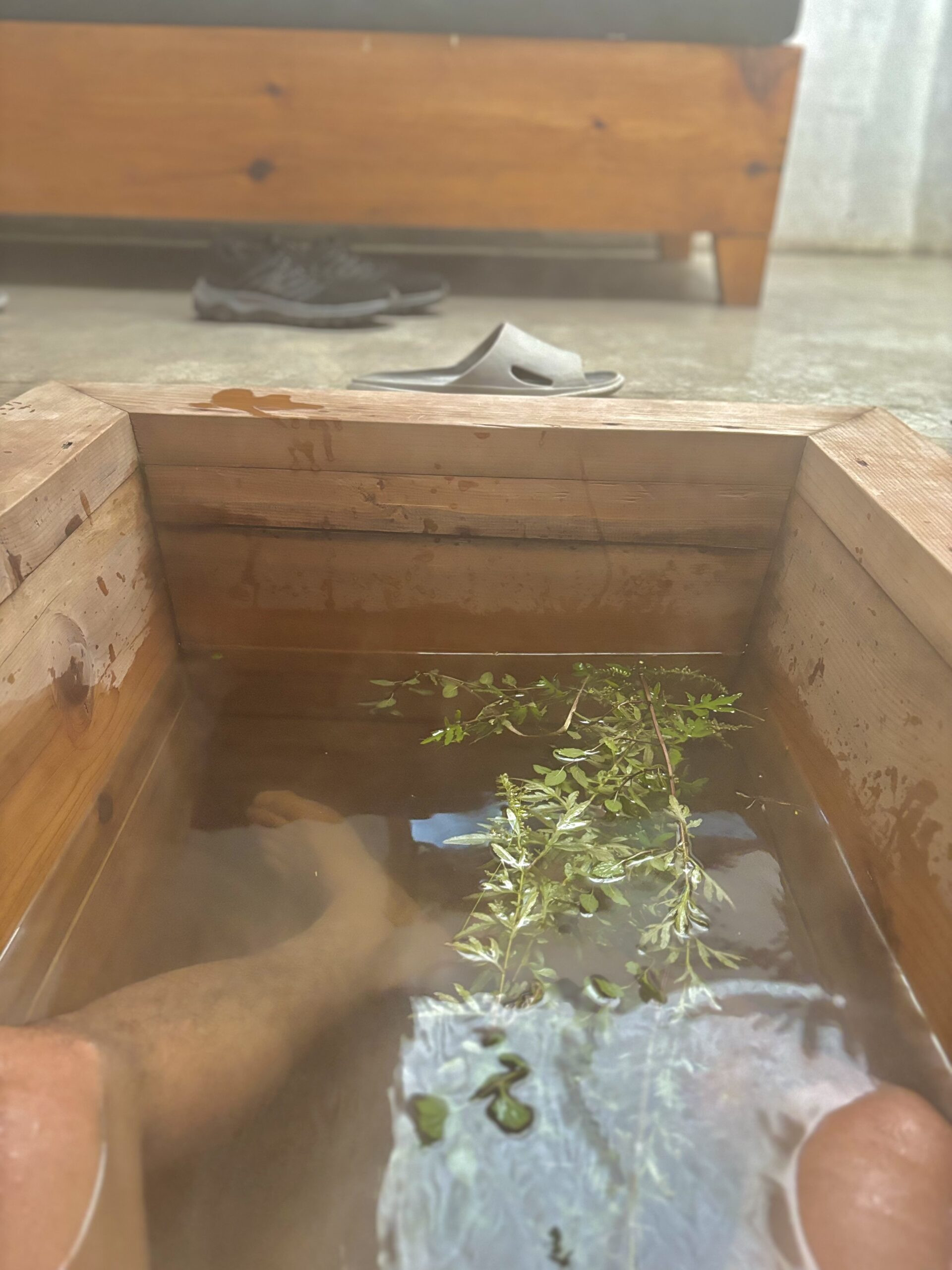 Relaxing in a traditional Bhutanese hot stone bath