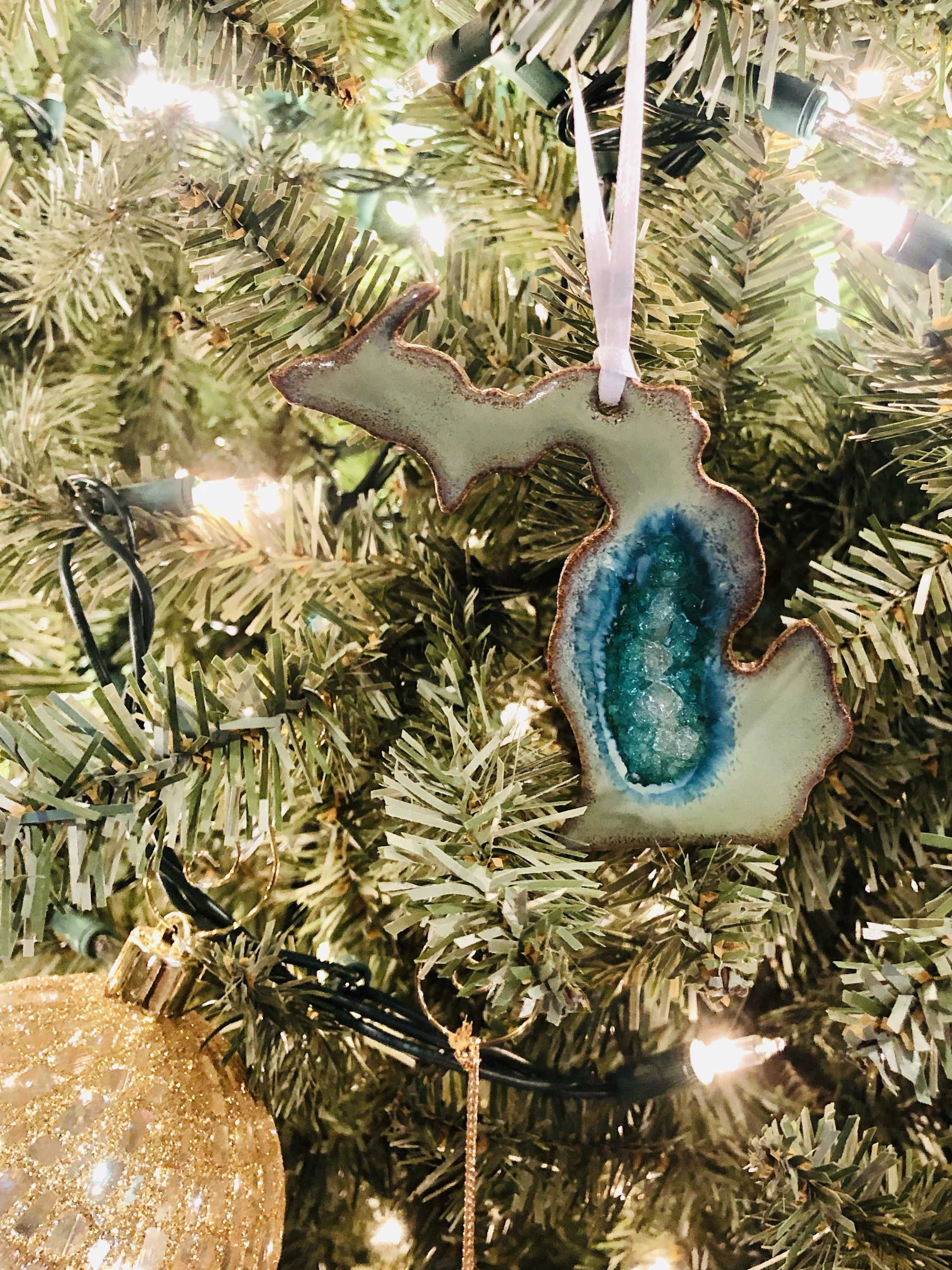 Travel Ornament showcasing personal transformation