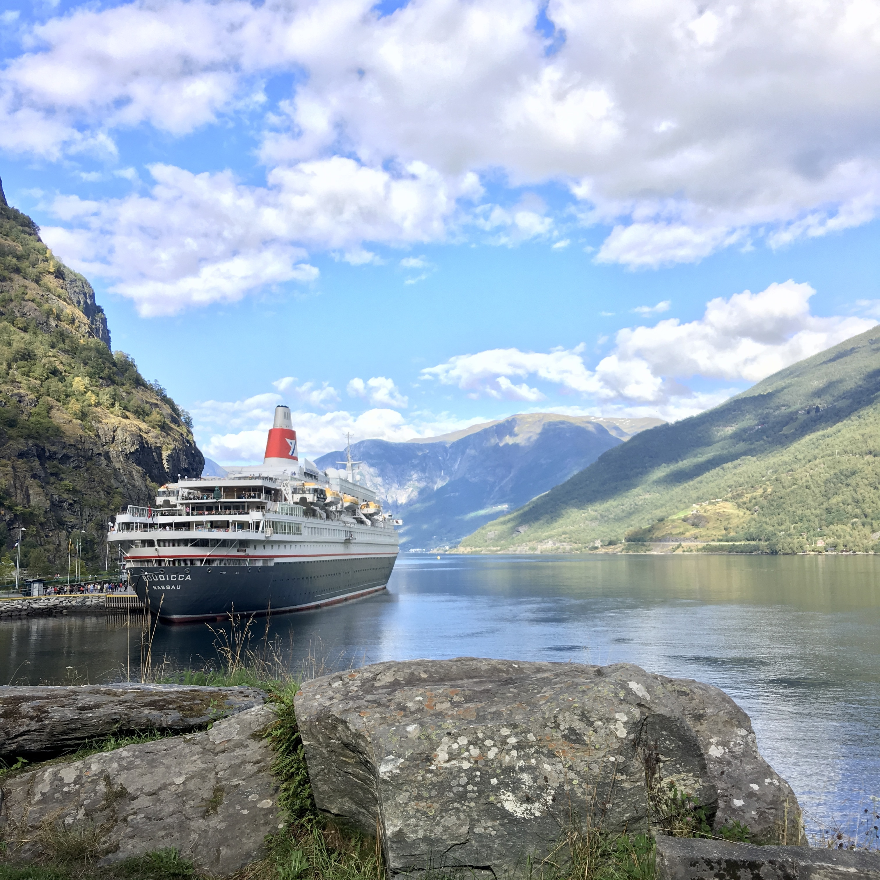 flam, norway on a summer day, cruise ship on the fjord