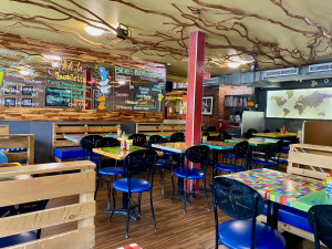 Inside La Banquise, the famous poutine restaurant in Montréal, with a calm morning atmosphere