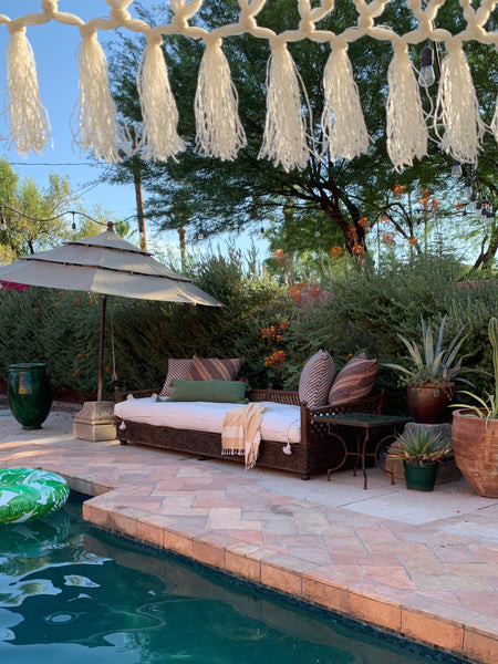 Back patio makeover with Heritage Saltillo tile, creating a wonderful oasis for swimming and lounging, exemplifying the India World Traveler Collection's transformation of spaces