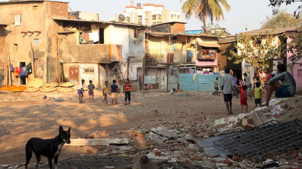 Children playing in a square in Dharavi