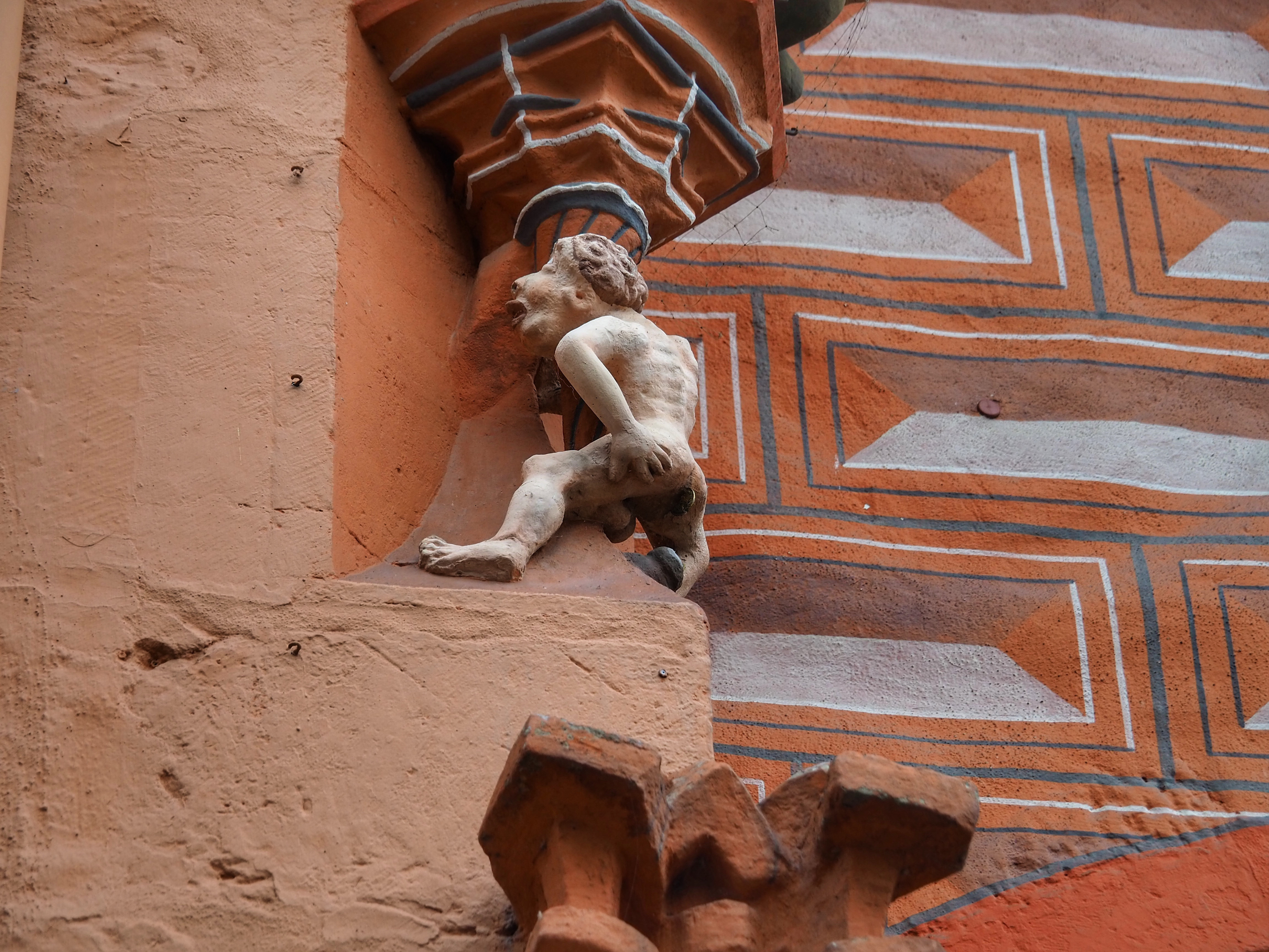 The Dukatenkacker sculpture in Goslar, a whimsical reminder to pay debts and uphold financial responsibility.