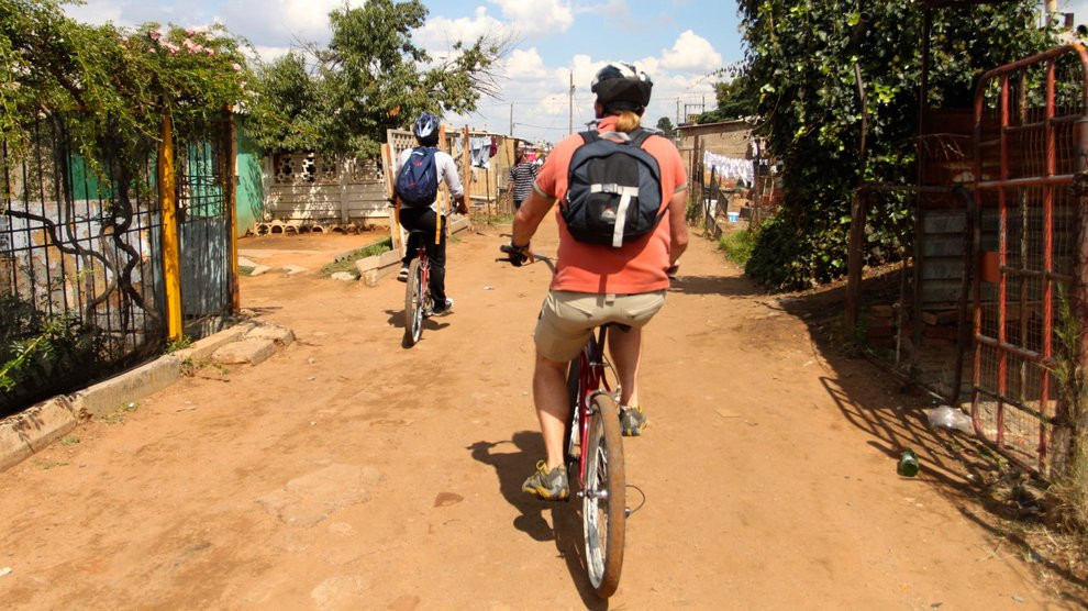 Touring Soweto, a South African township, by bike