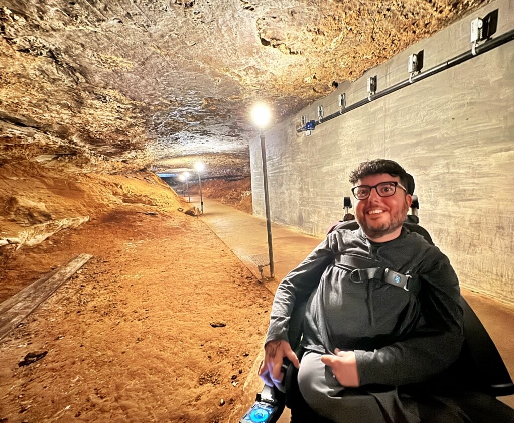 Wheelchair using visitor enjoy the smooth paved path in Mammoth Cave National Park