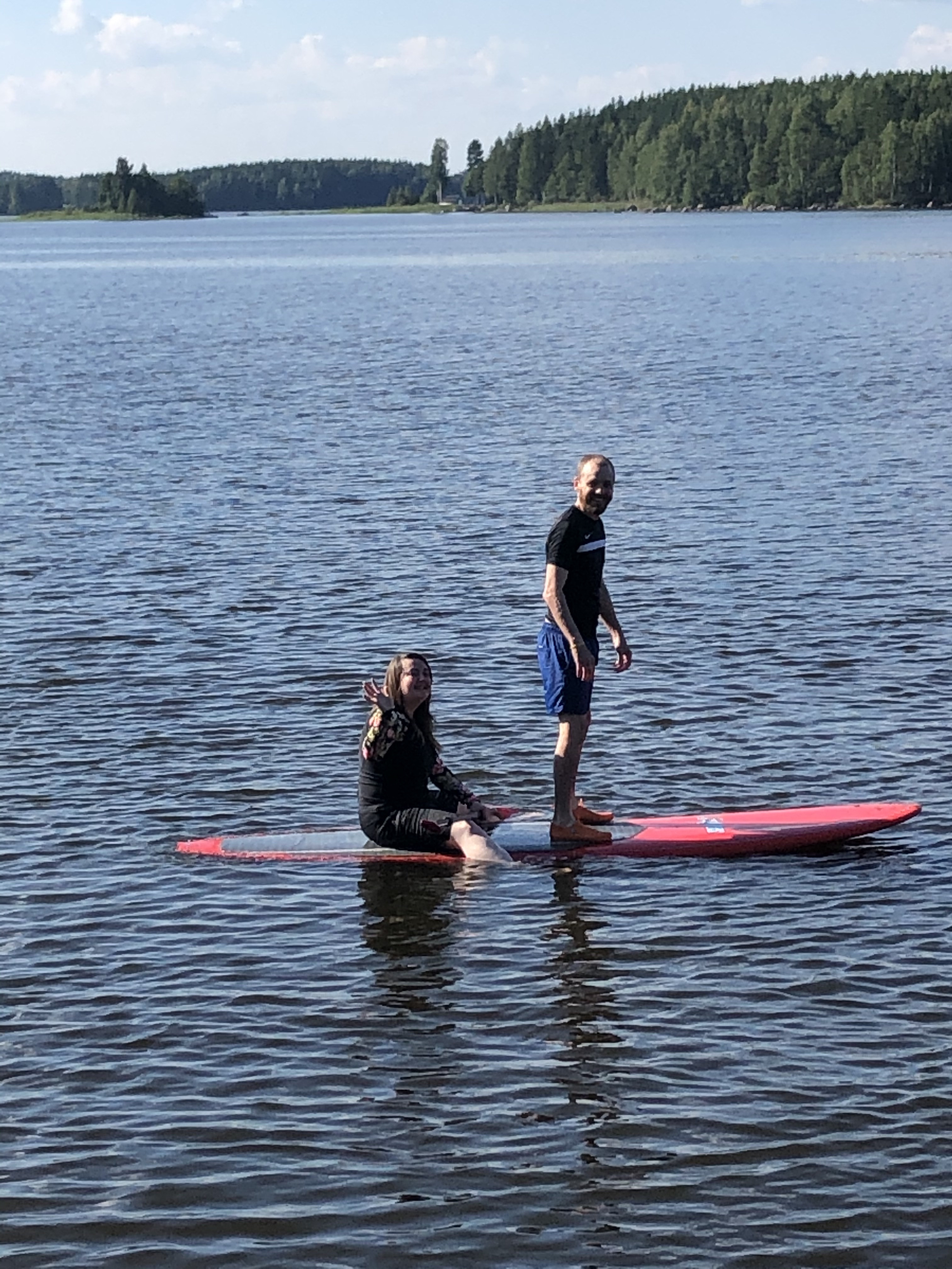 Trying paddleboarding on a Swedish lake
