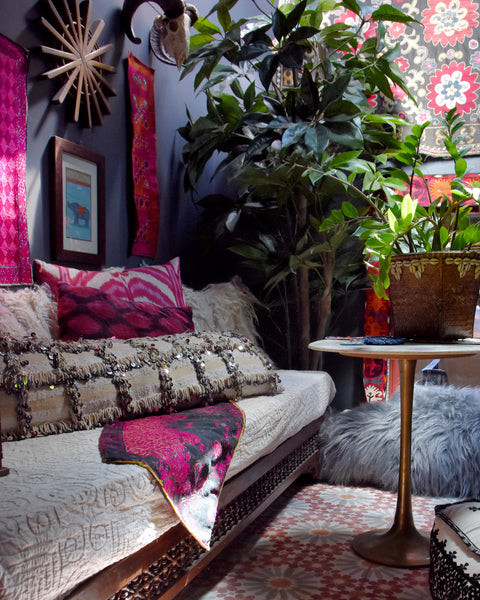 Exotic getaway nook with layers of textiles, transforming a transition space into a cozy and inviting tea party spot, part of the India World Traveler Collection