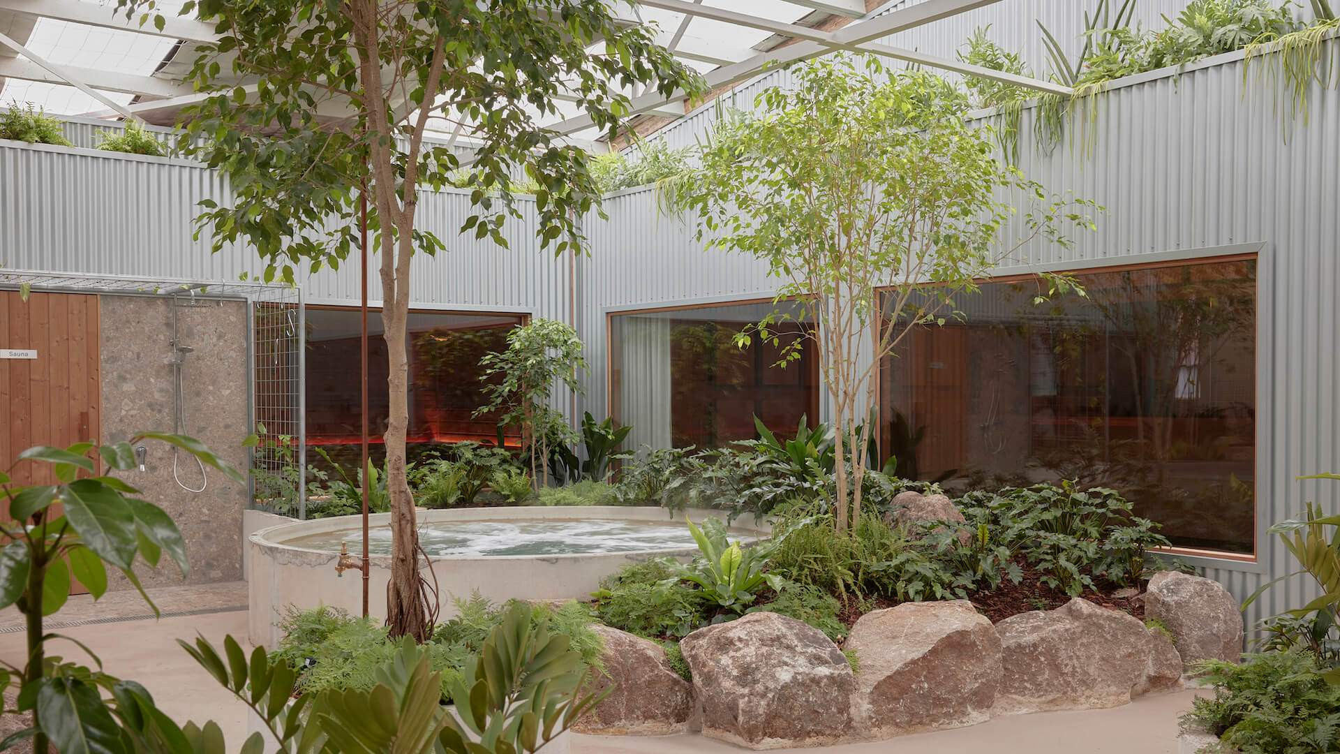 Inner Studio Collingwood day spa in Melbourne, featuring a relaxing seating area with a fireplace