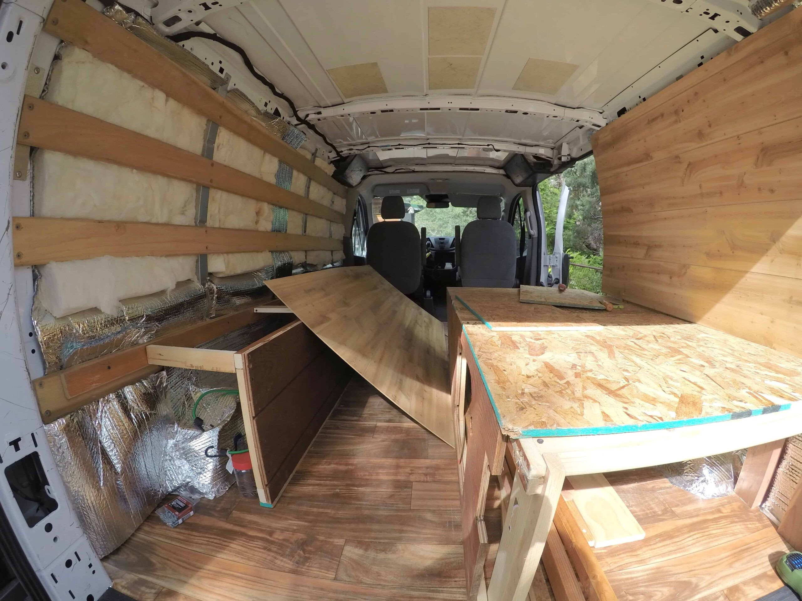 Installing faux wood wall panels in a Ford Transit van conversion