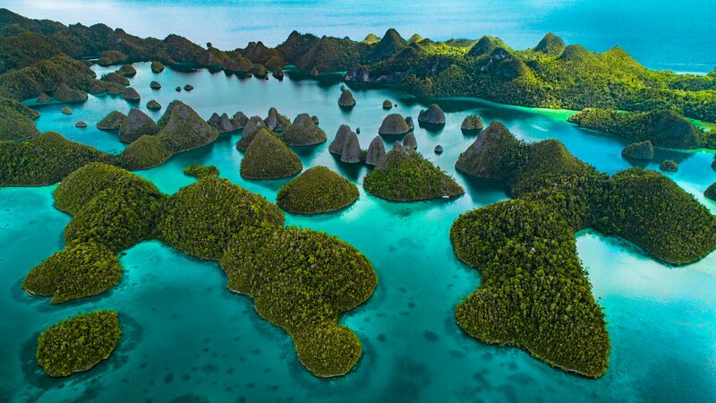 Aerial view of Raja Ampat, Indonesia, showcasing its stunning island formations