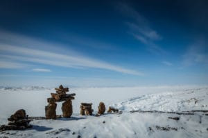 Iqaluit, Nunavut showcasing surreal landscapes and starry skies during winter