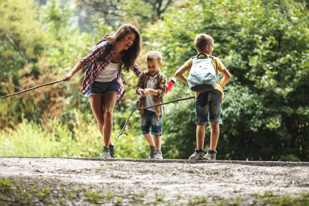 A family exploring the ancient ruins of Delphi, Greece, demonstrating responsible and safe travel practices, ensuring a memorable experience.