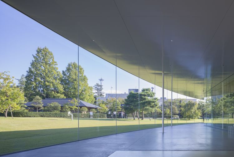 Exterior view of the 21st Century Museum of Contemporary Art, Kanazawa, showcasing its modern and circular design
