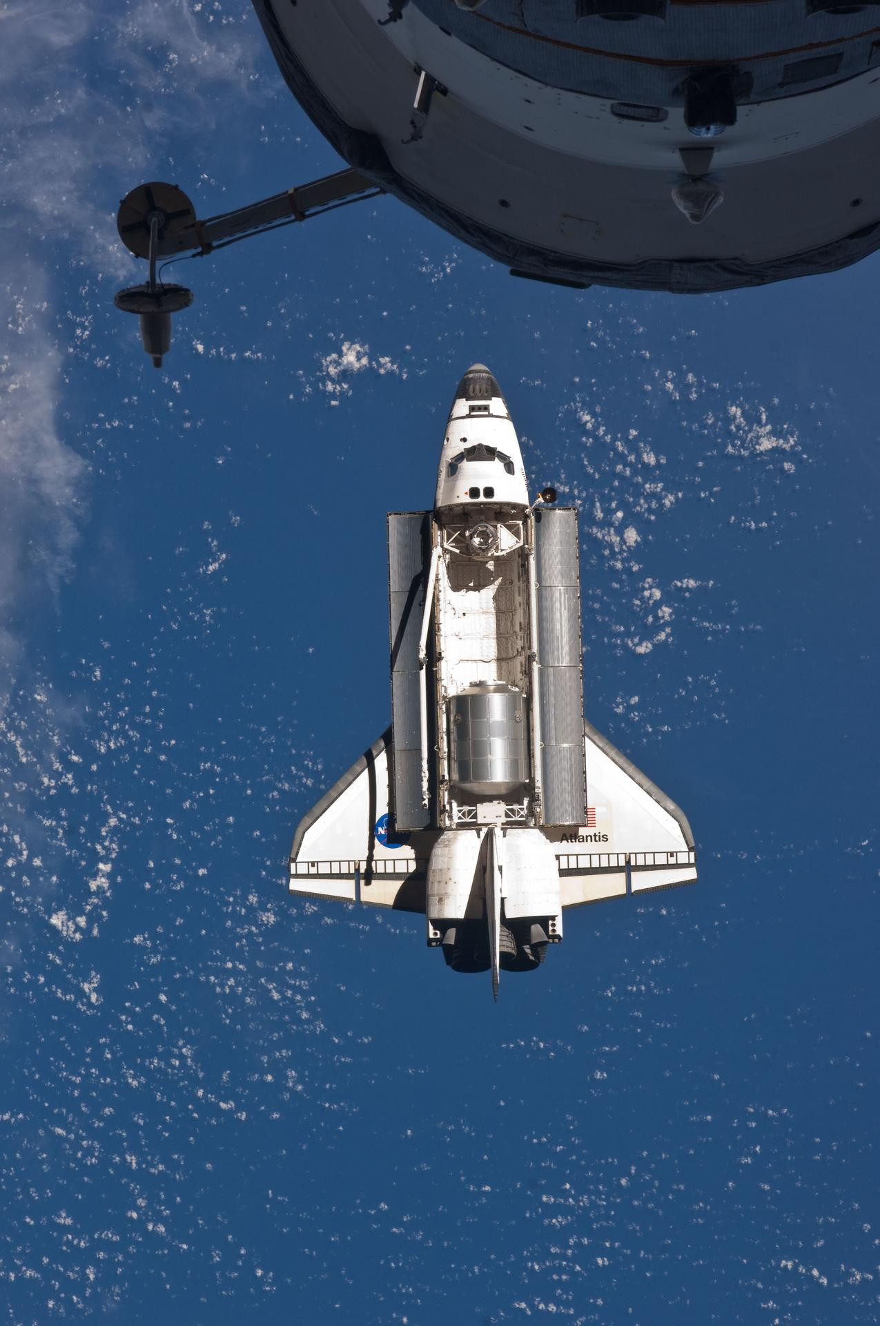 The space shuttle Atlantis is pictured prior to a perfect docking with the International Space Station at 10:07 a.m. (CDT).