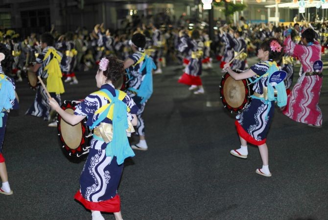 Energetic performers at the Morioka Sansa Odori Festival, the world's largest taiko drum parade.