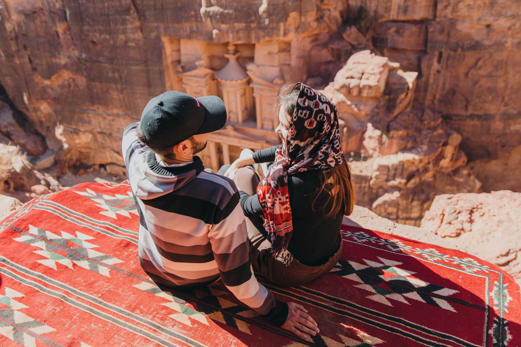 Travelers enjoying the view of Petra, Jordan