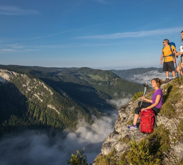 Hikers enjoying a scenic trail in the Haut-Jura