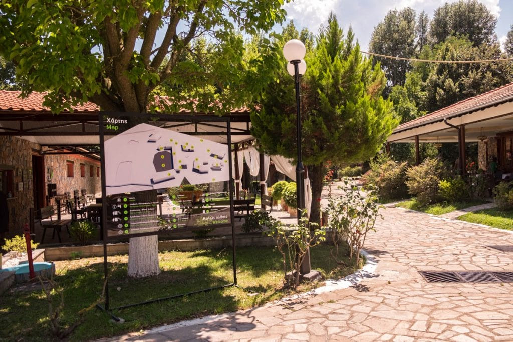 Entrance sign to the Mud Bath of Krinides, highlighting its therapeutic mud