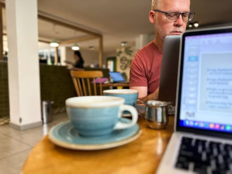 Ken working in Laureles at a coworking space and coffee shop