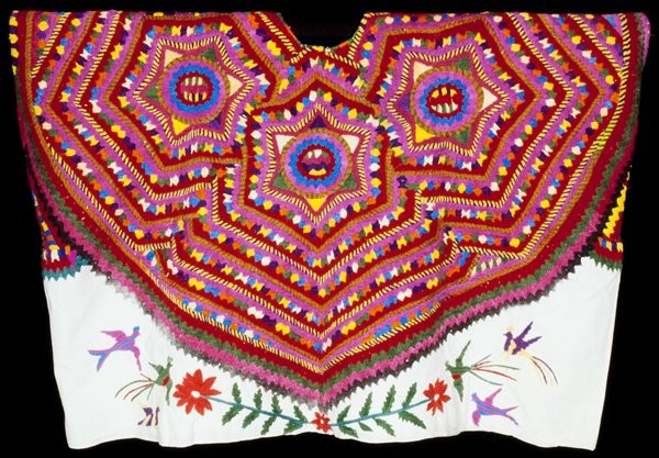 Tay textile featuring geometric and nature-inspired motifs