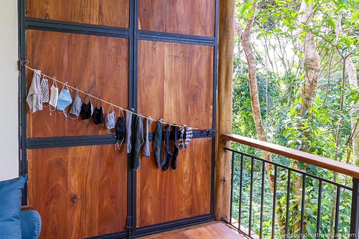 Clothes hanging on a travel clothesline, illustrating efficient travel laundry