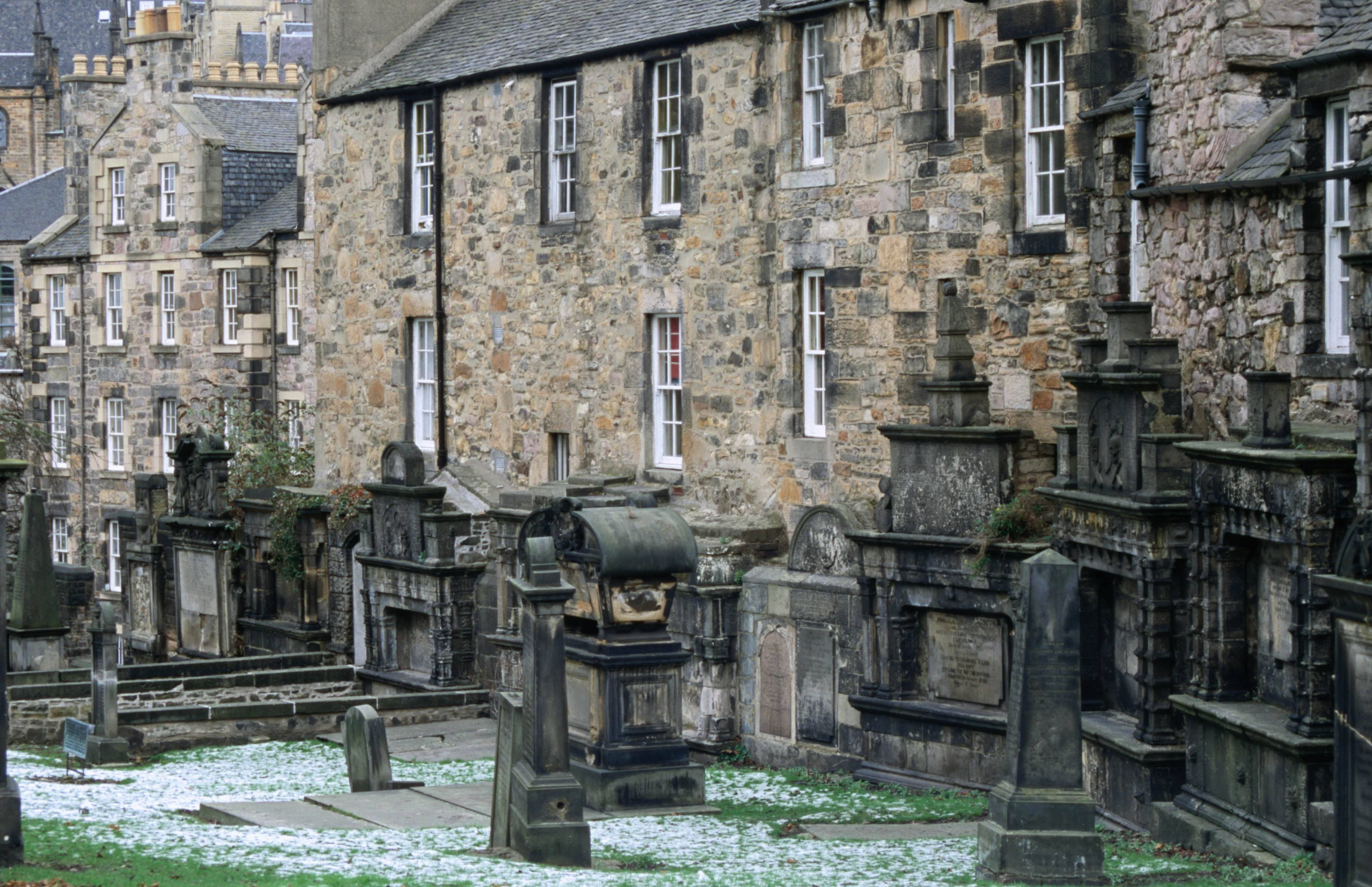 Snow on gravestones in Greyfriars Kirkyard during Edinburgh's low season