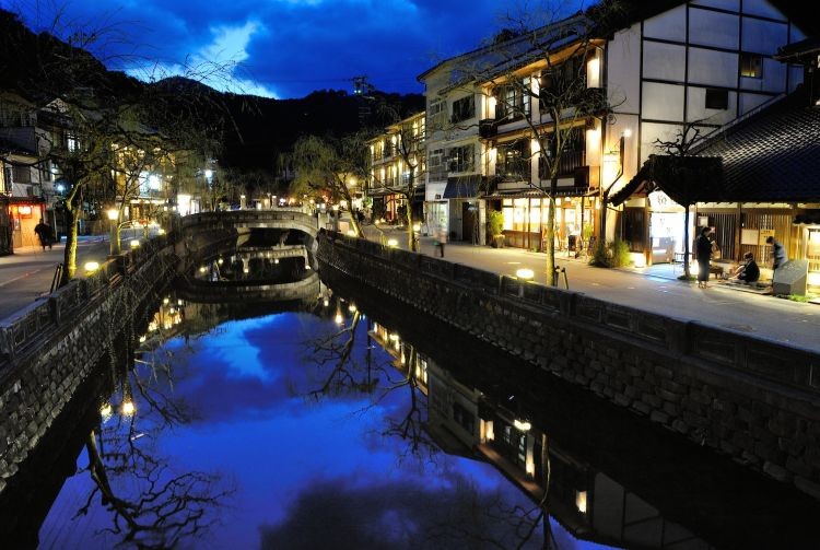 Kinosaki Onsen is surrounded by mountains and a picturesque river, offering stunning natural beauty