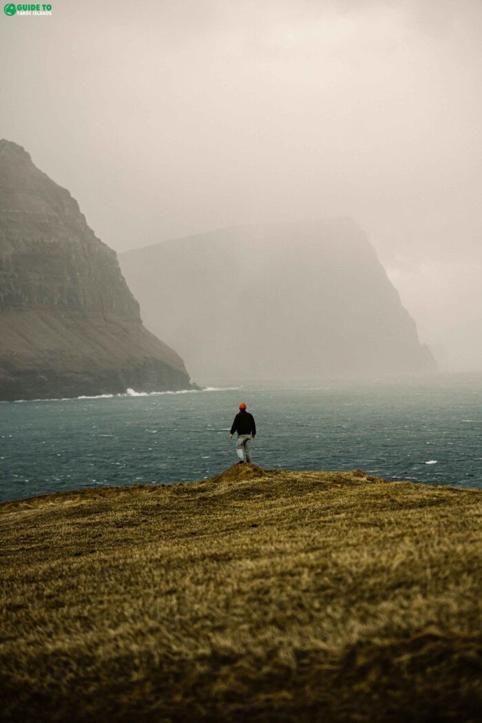 Man standing on Viðoy Island