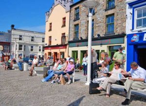Market Square in Clifden, portraying a relaxing summer day