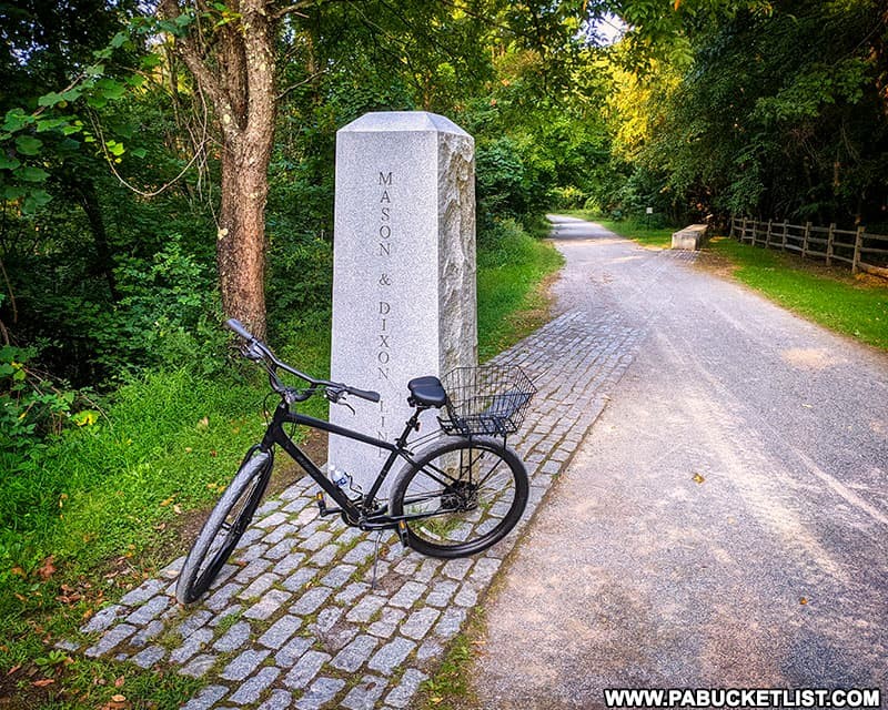 Granite monument at the Mason and Dixon Line Park along the Great Allegheny Passage.