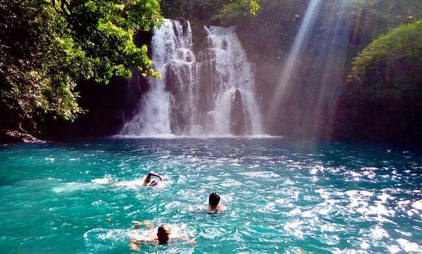 Wild swimming in a waterfall pool in Mauritius. Photo: Mauritius Conscious