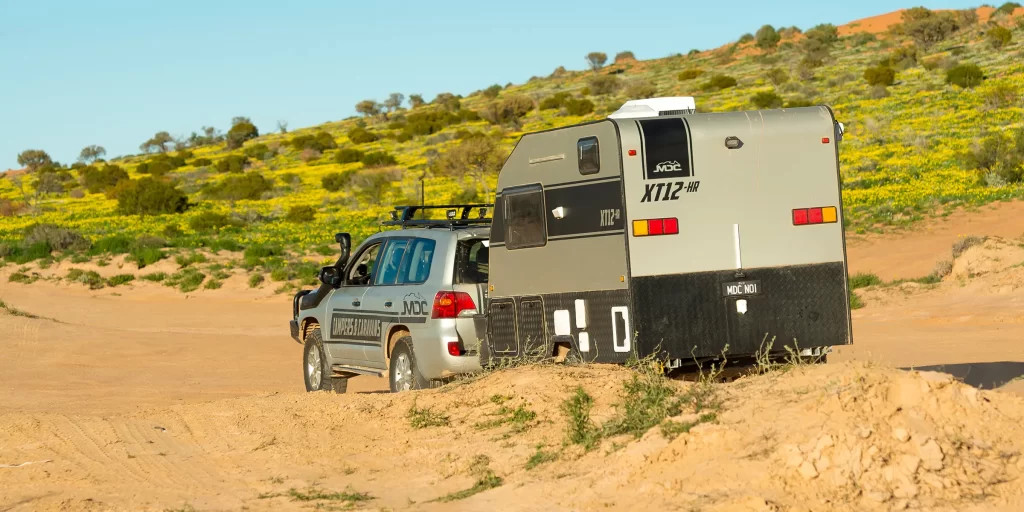 MDC USA XT12HR Offroad travel trailer designed in Australia, now available in North America, perfect for off-road adventures with a premium finish and feature-packed design.