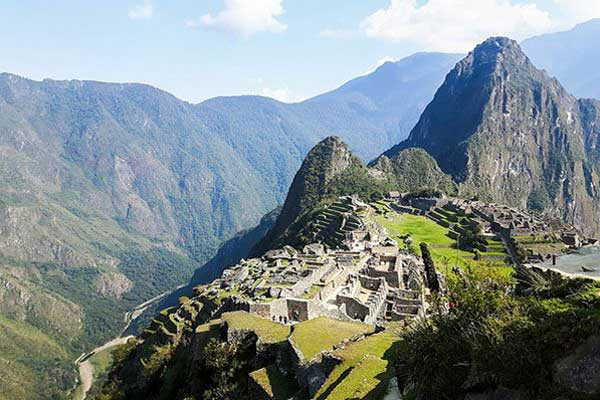 Machu Picchu, a UNESCO World Heritage Site, showcases the stunning Incan architecture against the backdrop of the Andes Mountains