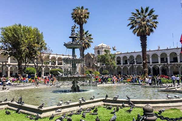 A bustling street scene in Lima, Peru, showcasing the vibrant city life